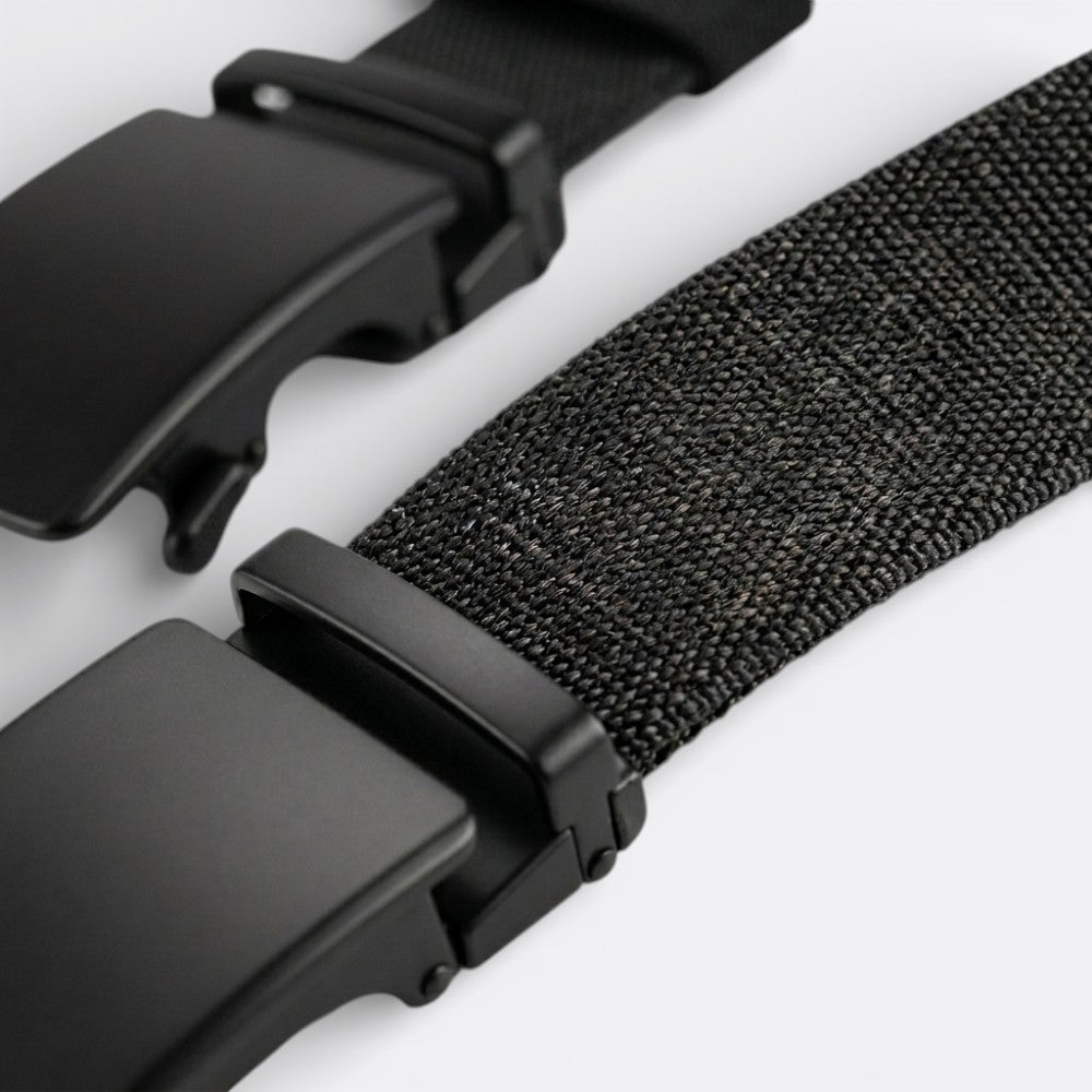 Le monde de la ceinture black adjustable fabric belt with a matte black buckle, perfect for everyday wear.