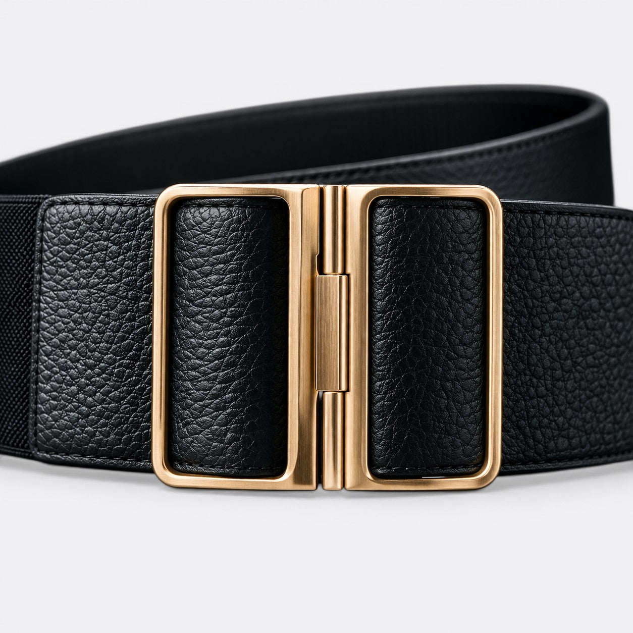 Le monde de la ceinture black wide elasticated belt with gold buckle. Textured leather.
