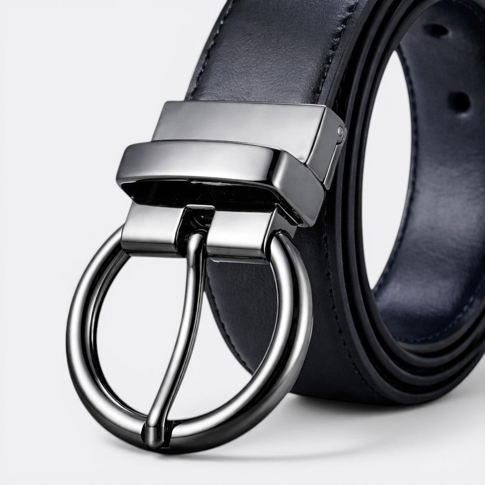 Le monde de la ceinture reversible leather belt with a gunmetal buckle, perfect for formal or casual wear.