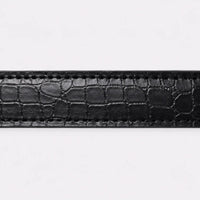 Détail de la matière crocodile noire de la ceinture — Le Monde de la Ceinture