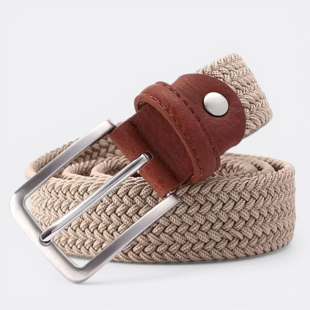 Le monde de la ceinture beige woven elastic belt with brown leather details and silver buckle.