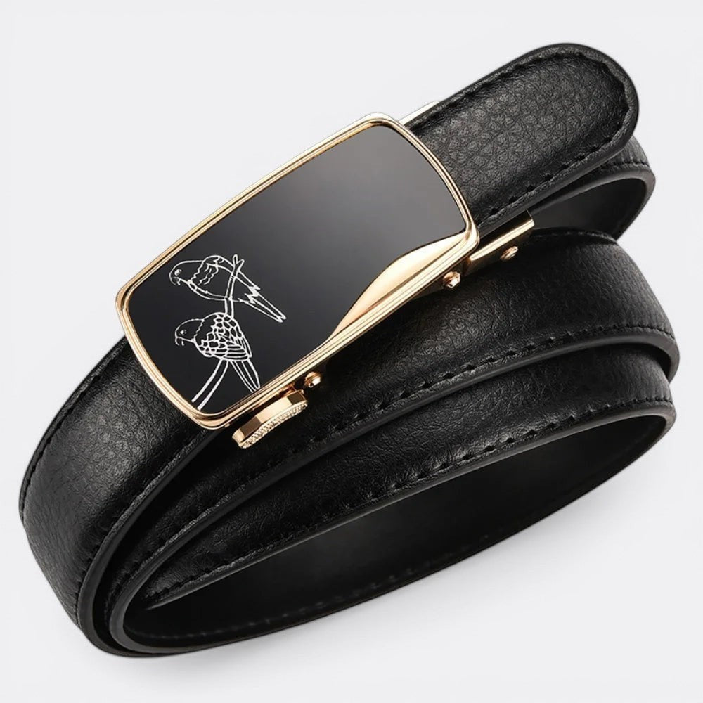 Le monde de la ceinture black leather automatic belt with gold buckle featuring a bird design. Adjustable fit for men.