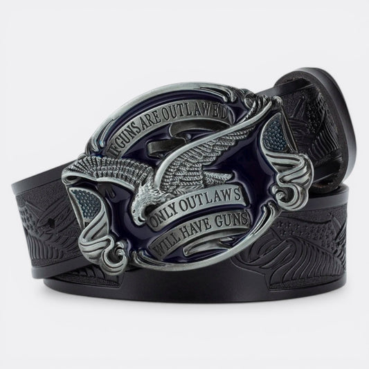 Le Monde de la Ceinture black leather belt with large silver and blue buckle featuring an eagle and American flag motif with text.