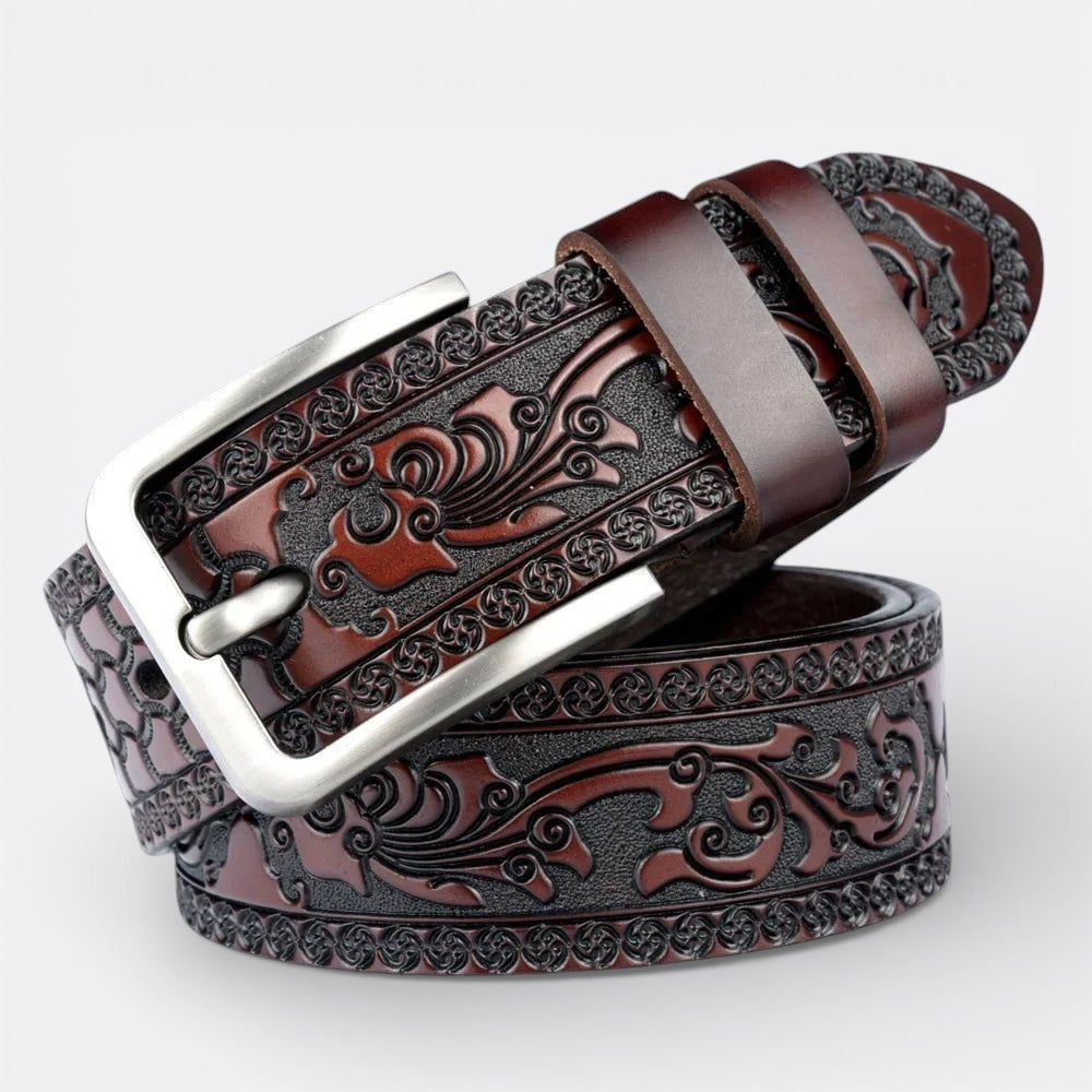 Le monde de la ceinture brown embossed leather tribal pattern belt with silver buckle.