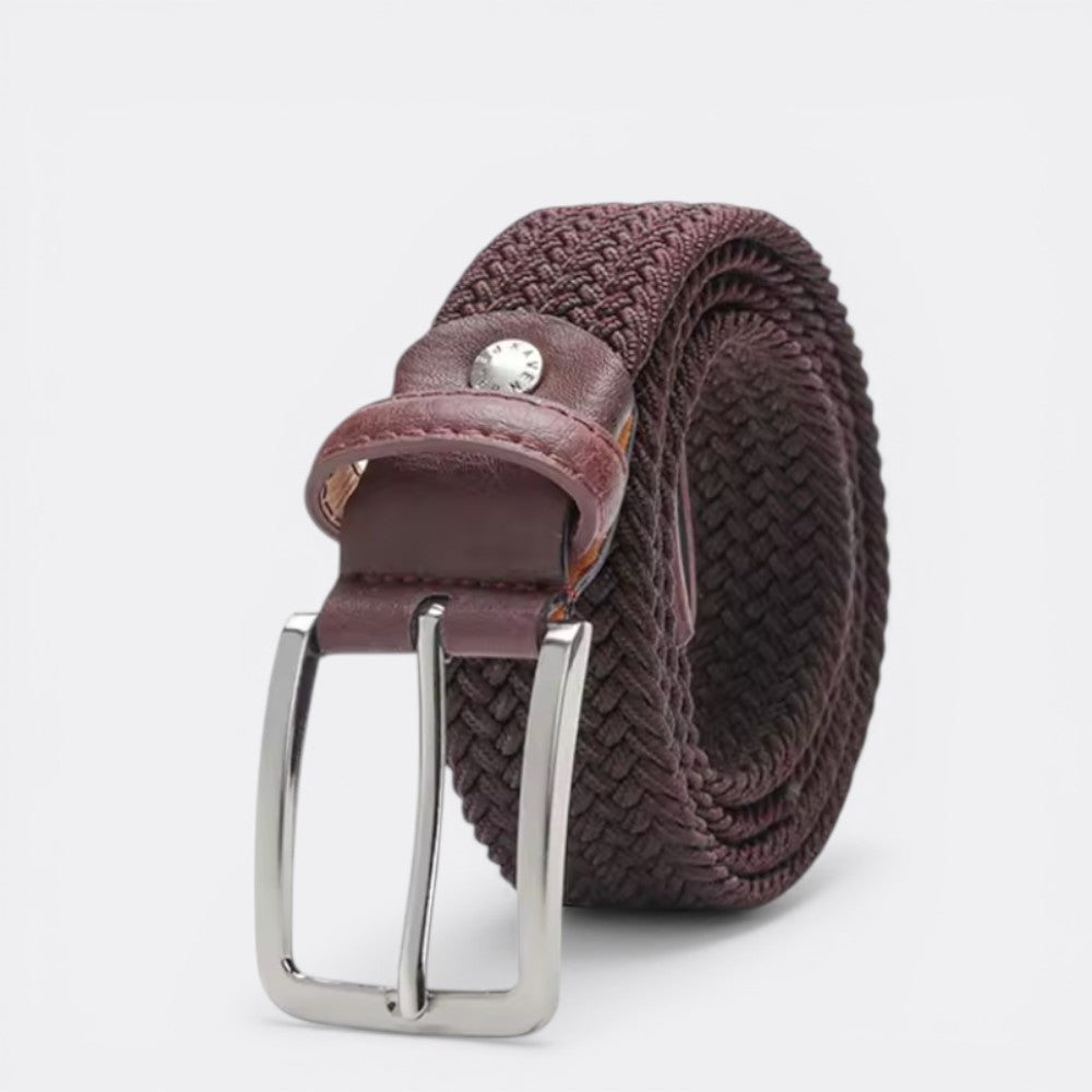 Le monde de la ceinture dark brown woven elastic belt with silver buckle. Comfortable and adjustable for everyday wear.