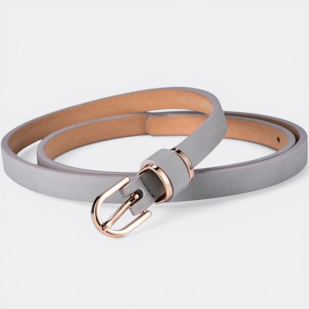 Le monde de la ceinture fine grey leather belt with gold buckle, ideal for dresses and trousers.