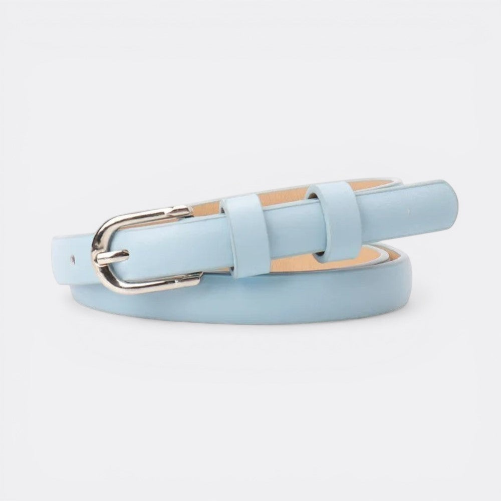 Le monde de la ceinture light blue leather skinny belt with silver buckle. Perfect for dresses, jeans, and tailoring.