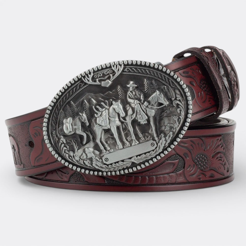 Le monde de la ceinture men's vintage leather belt with ornate silver buckle depicting cowboys and horses.