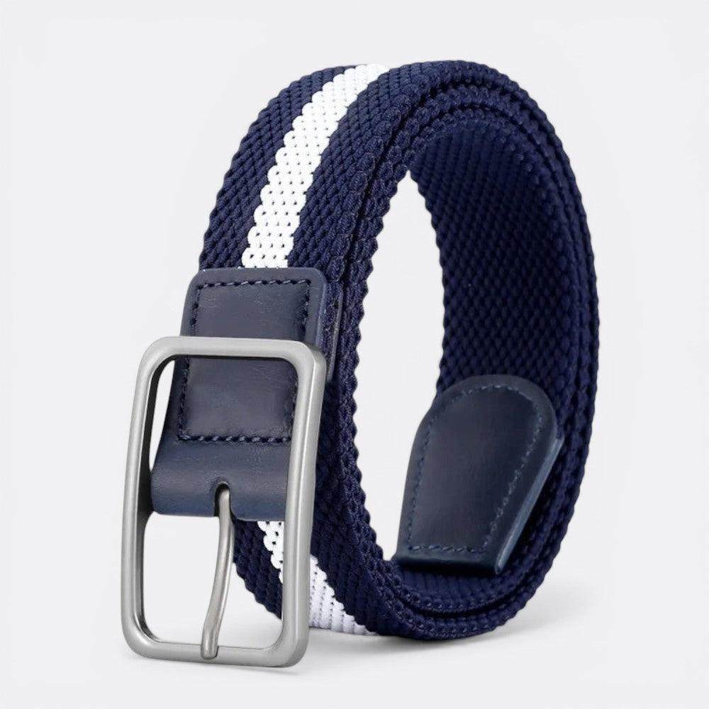 Le monde de la ceinture navy blue elastic belt with white stripe detail and silver buckle.