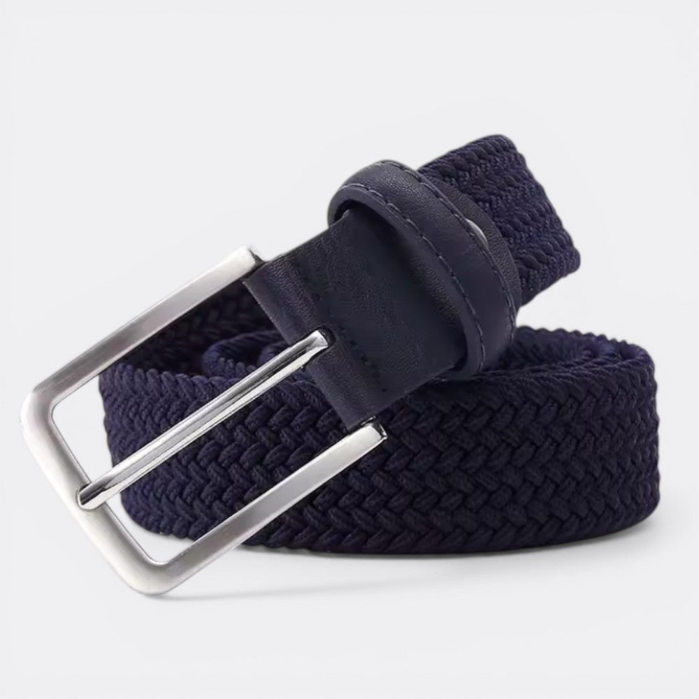 Le monde de la ceinture navy blue woven elastic belt with silver buckle and leather trim.