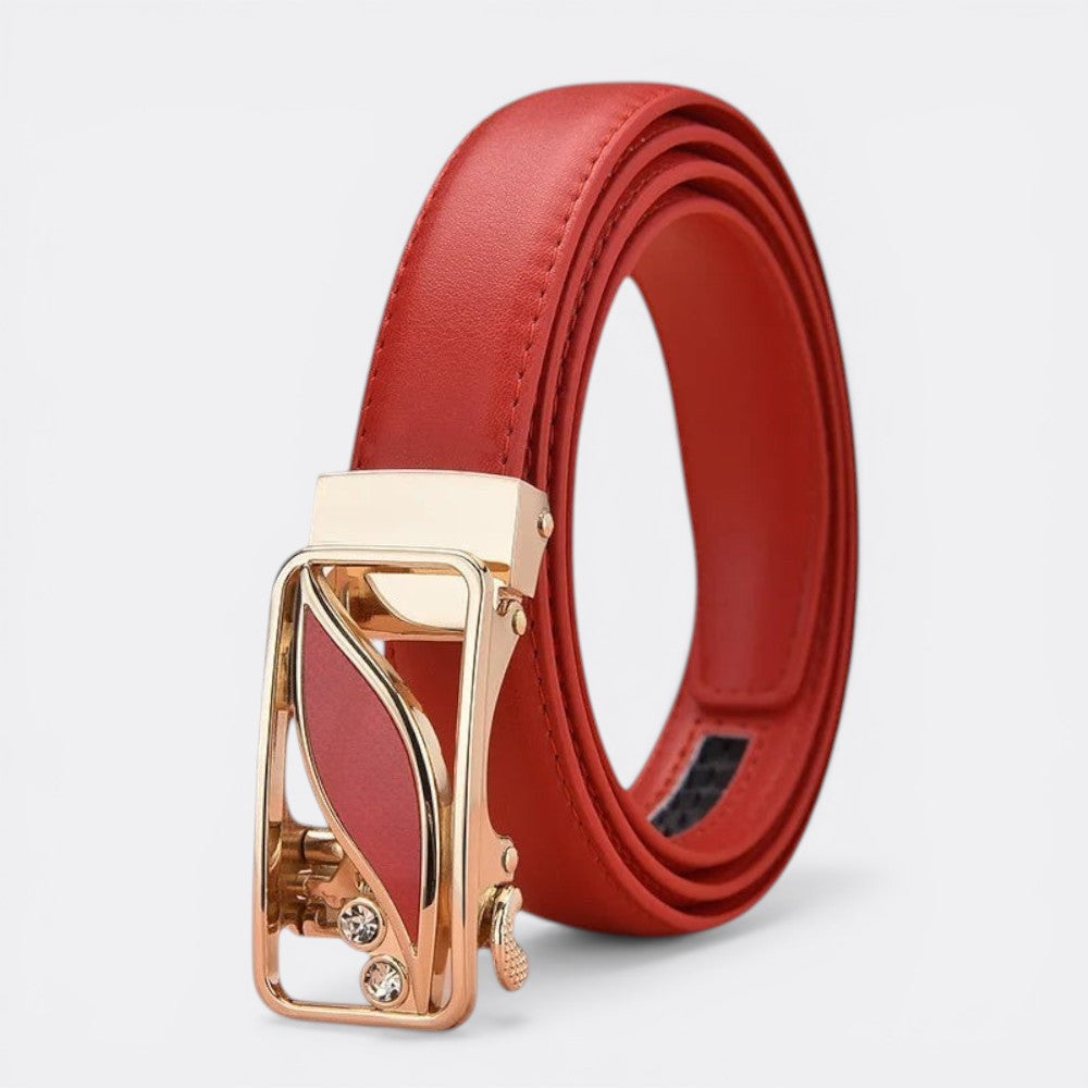 Le monde de la ceinture red leather reversible women's belt with gold buckle and crystal accents.