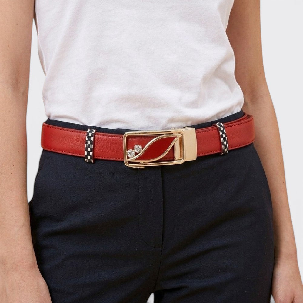 Le monde de la ceinture red leather reversible women's belt with gold buckle and crystal accents.