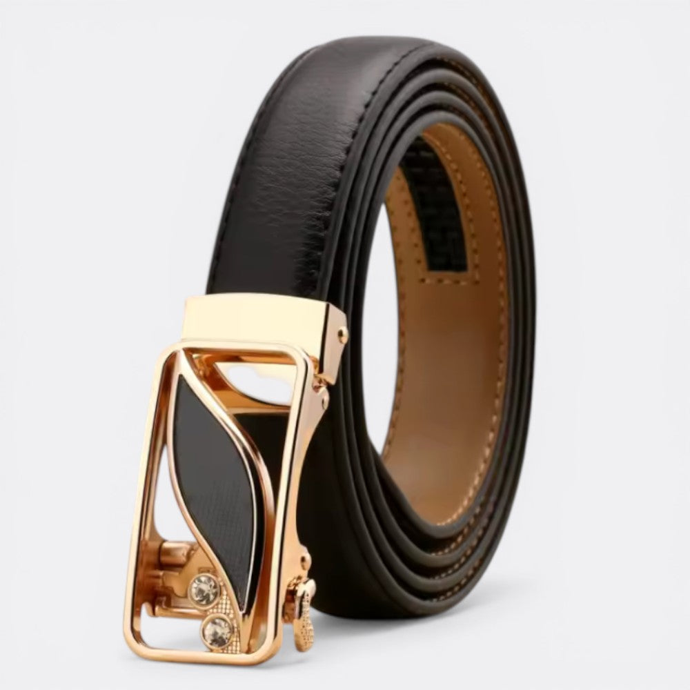 Le monde de la ceinture women's reversible leather belt with gold buckle and crystal accents. Black and tan.