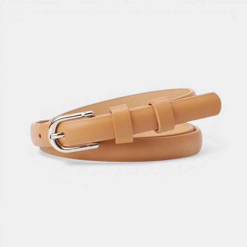 Le monde de la ceinture women's fine tan leather belt with silver buckle, perfect for cinching dresses or jeans.