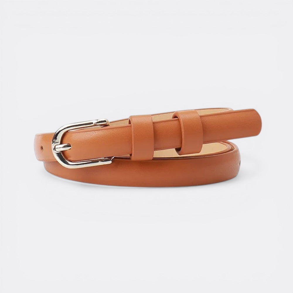 Le monde de la ceinture women's fine tan leather belt with silver buckle, perfect for dresses and jeans.
